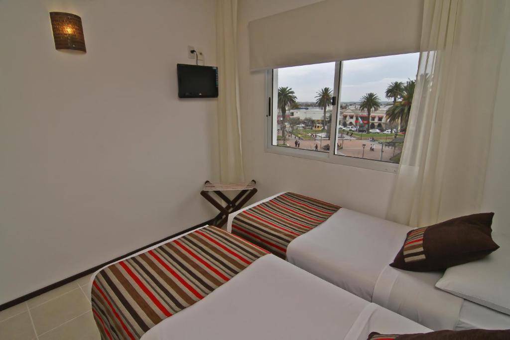 De la Plaza Hotel Maldonado Habitación foto